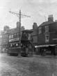 Victoria Street Maddison's Corner with Tram